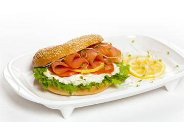 Cream cheese and smoked salmon bagel. Selective focus.