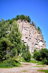 Obraz premium Rock Iconostas on the right bank of the river Biya with a bas-re