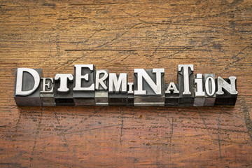 determination word in metal type