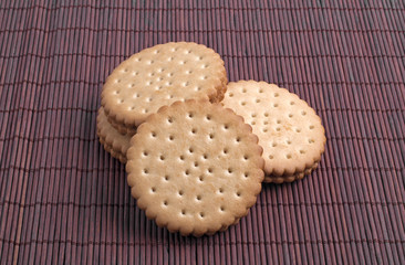 Cookies on a dark background of bamboo