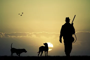 Fototapeten hunter at sunset © adrenalinapura