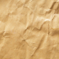 Naklejka premium Crumpled brown envelope paper texture