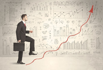 Business man climbing on red graph arrow concept