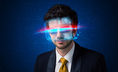 Man with future high tech smart glasses