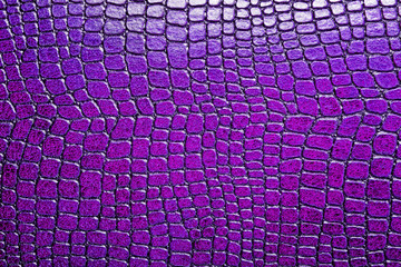 Violet alligator patterned background