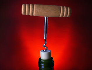 Bottle opener close-up, on dark color background