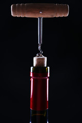 Bottle opener close-up, on dark background