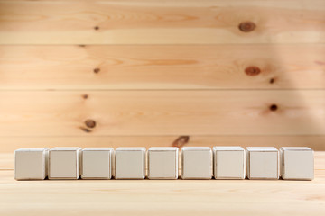 Educational cubes, on wooden background