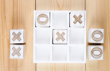 Game of Tic Tac Toe on wooden background