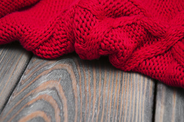 knitting on rustic wooden background