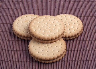 Cookies on a dark background of bamboo