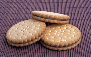 Cookies on a dark background of bamboo