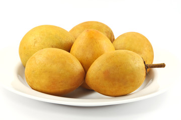 fresh Sapodilla fruits on white background