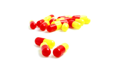 Colored pills on a white background