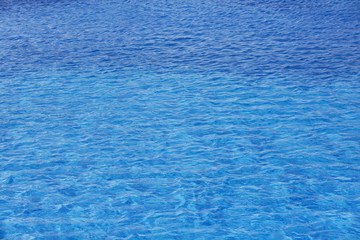 Blue water in swimming pool