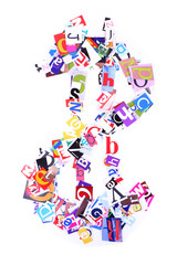 Dollar sign made of colorful newspaper letters isolated on