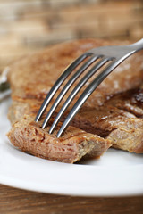 Delicious grilled meat on table, close-up
