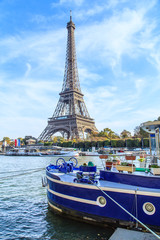A view of a Seine river with Eiffel Tower in Paris, France