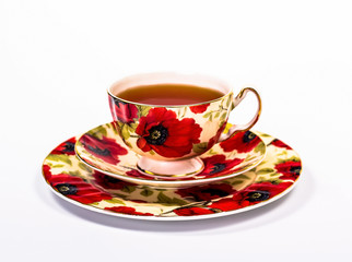 red cup flowered with isolated on a white background