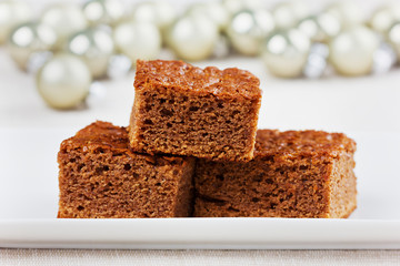 brownie, closeup chocolate cake in white plate, selective focus