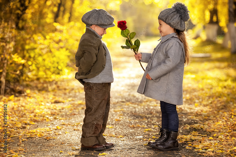 Wall mural autumn romantic girl and boy