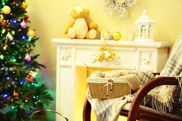 Beautiful Christmas interior with decorative fireplace and