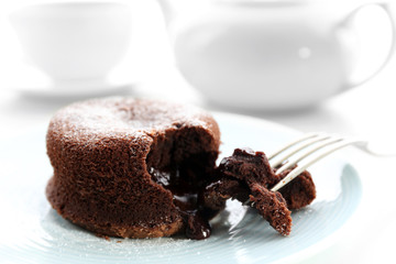 Hot chocolate pudding with fondant centre on plate, close-up