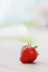 Strawberry on a wooden background