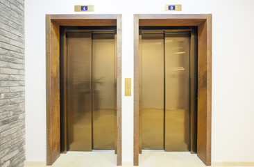 Luxury golden passenger lift door 