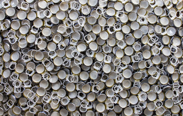 Aluminium plastic background, which is used as a bottle opener.