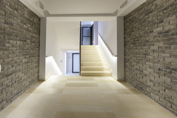 Stone wall corridor with staircase 