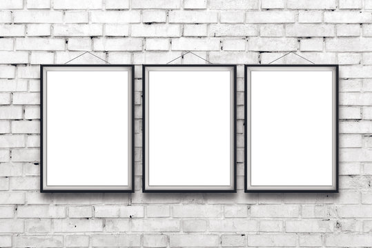 Three blank vertical paintings poster in black frame