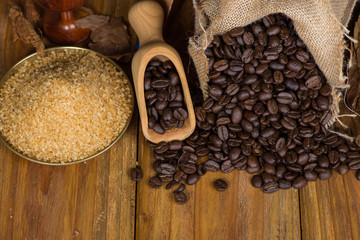 Cuban coffee, rum and cane sugar on table