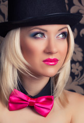 beautiful cabaret woman wearing tophat, bow-tie and corset again