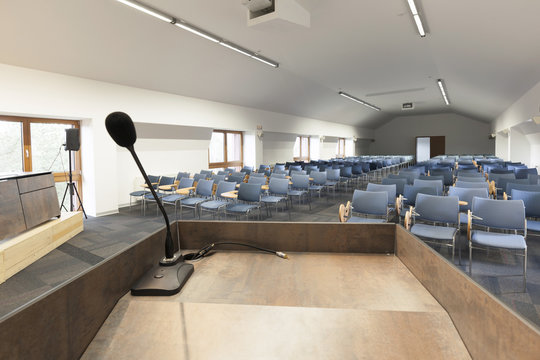 Speaker's table in Interior of a modern conference hall 