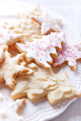 Iced Christmas cookies with sugar pearls