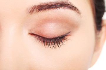Close up on woman eye with an artistic makeup