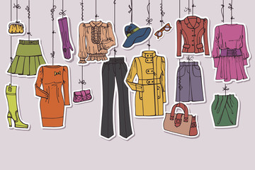 Womans clothing and accessories hanging on ropes