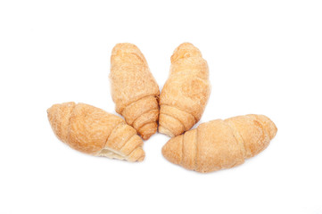 Fresh and tasty croissants isolated on white background