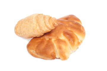 Bun and tasty croissants isolated on white background