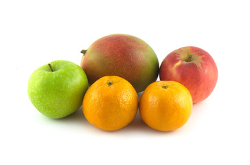 Ripe appetizing fruits: mango, apples and tangerines isolated