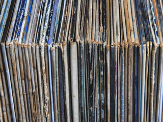 stack of vinyl records in envelopes