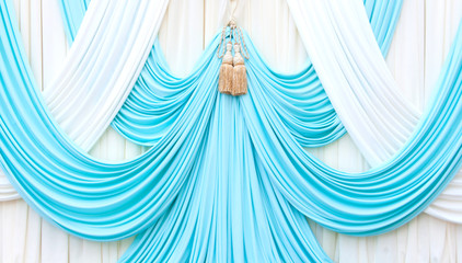 blue and white curtain on stage