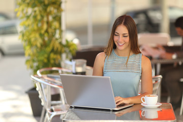 Self employed woman or student working in a restaurant