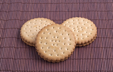Cookies on a dark background of bamboo