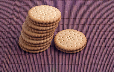 Cookies on a dark background of bamboo