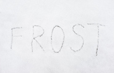 inscription frost on snow-covered ice