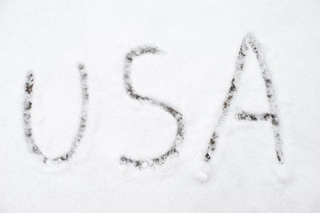 inscription usa on snow-covered ice