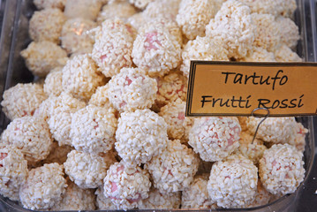 Chocolate with truffles and red fruits.
