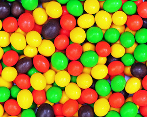 Fototapeta na wymiar Multicolored candies for use as background.